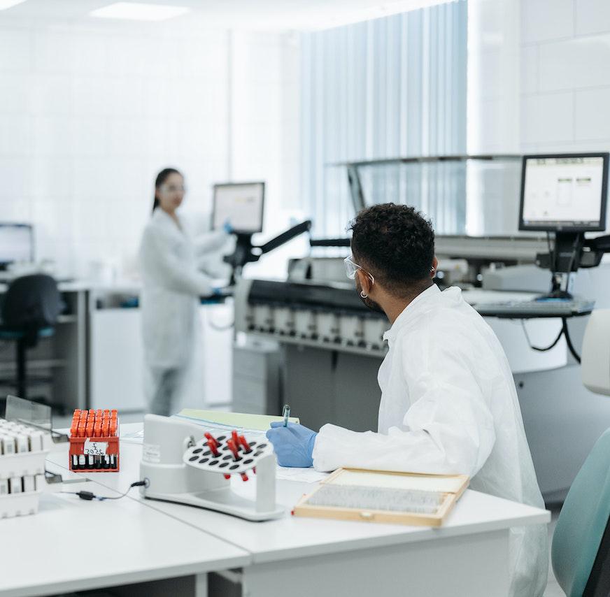 Two people working in a science lab